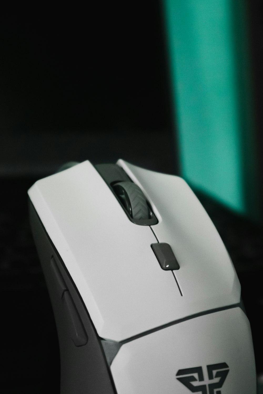 a close up of a computer mouse on a desk