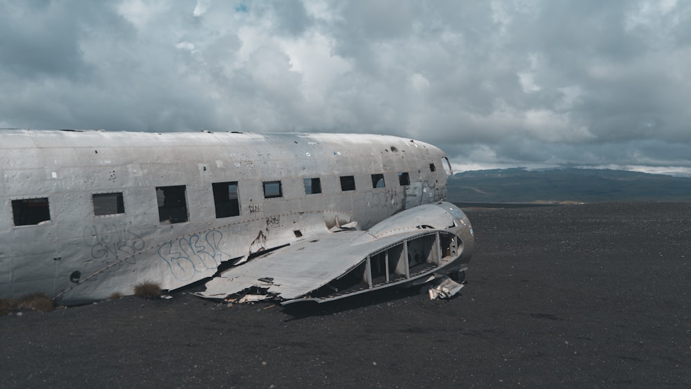 a plane that is sitting in the dirt