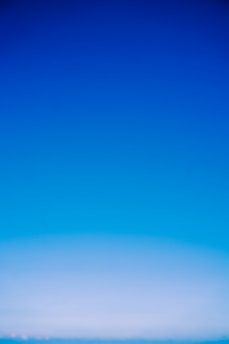 A serene blue-hued header image with soft pastel gradients, evoking calm and introspection.