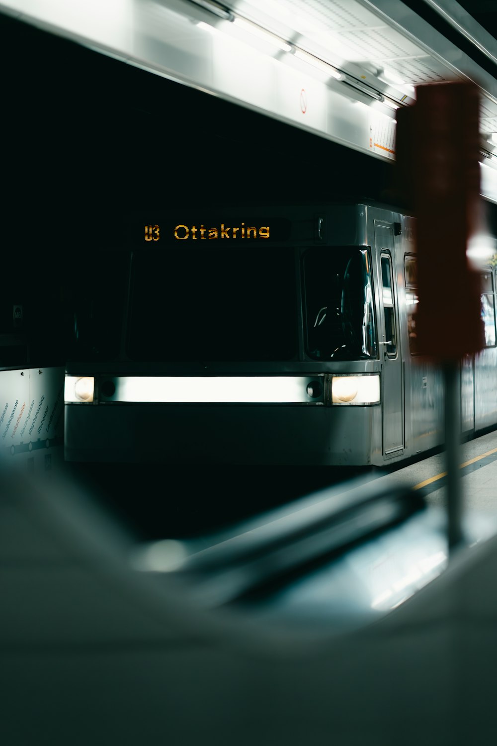 a blurry photo of a train pulling into a station