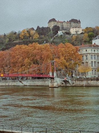 A charming historic landmark surrounded by vibrant autumn foliage.