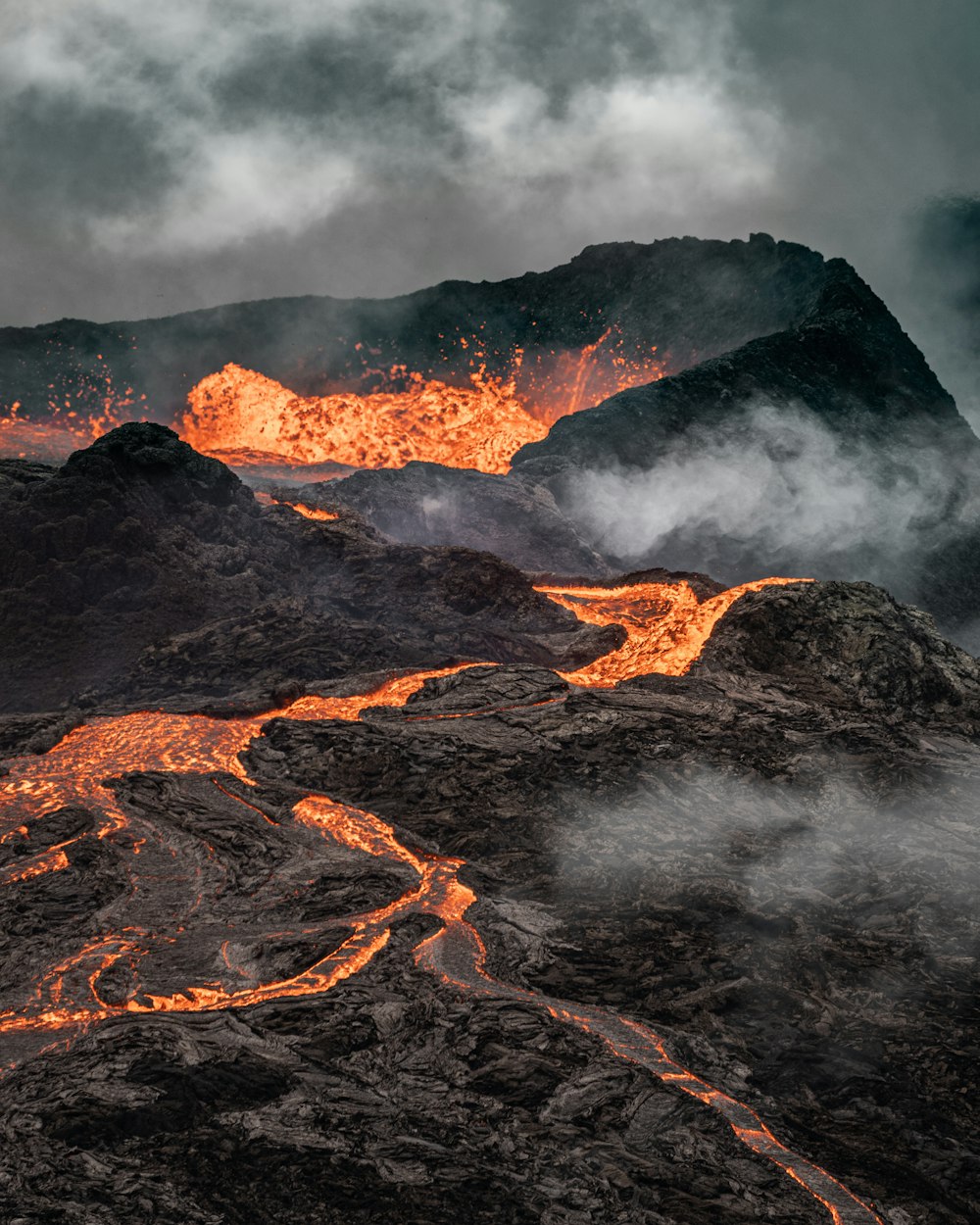 a mountain covered in lava and steam