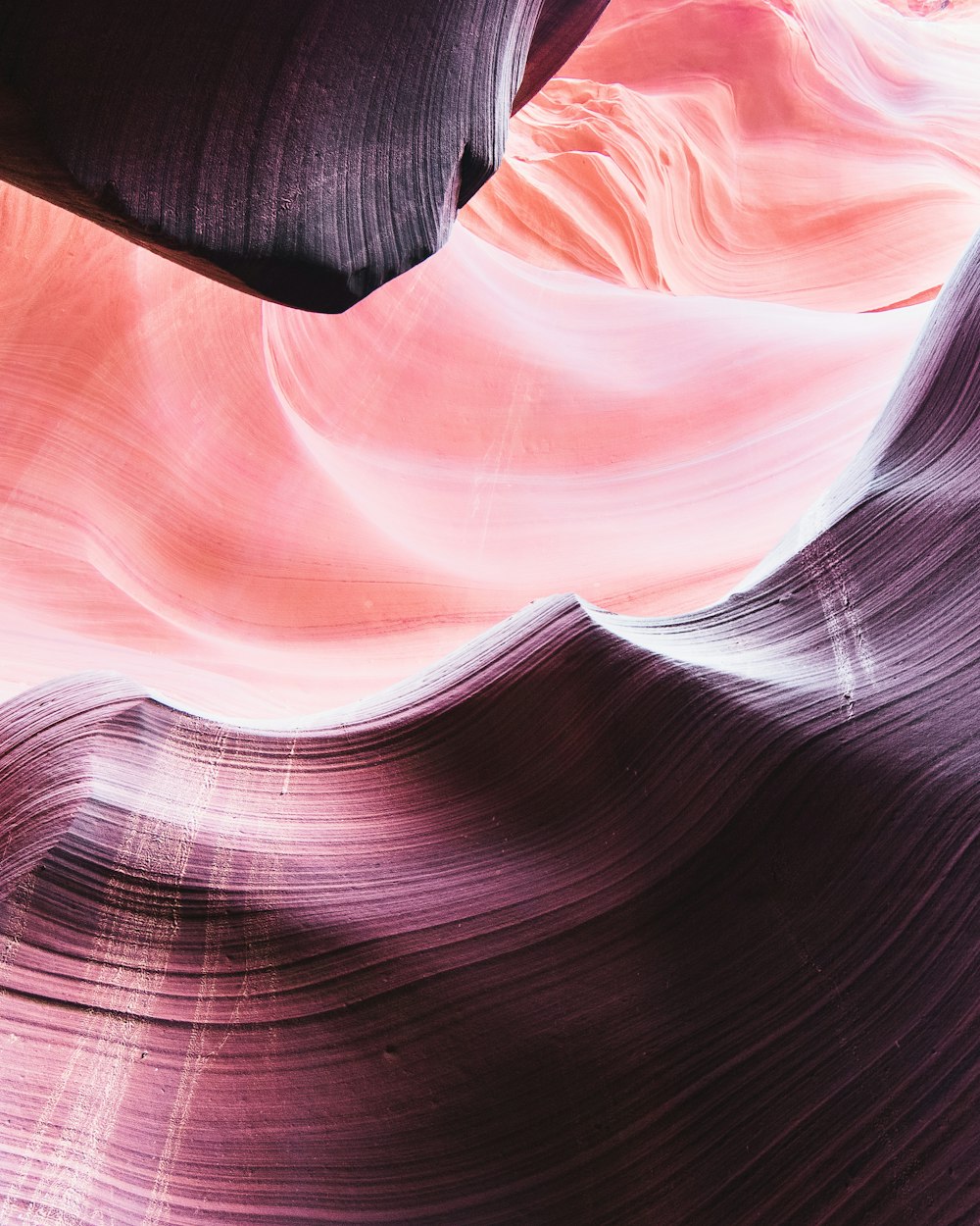 a large wave of water in a canyon