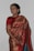 A happy customer wearing a beautiful saree from Shreyanshi Fashion.