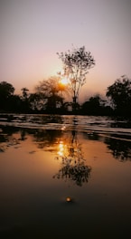 A serene landscape with a peaceful sunset, symbolizing tranquility and reflection.