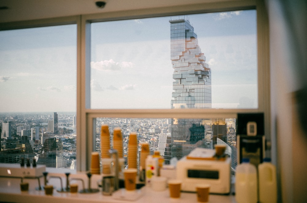 a view of a city from a kitchen window