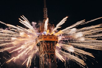 Eiffel tower that has some fireworks in it