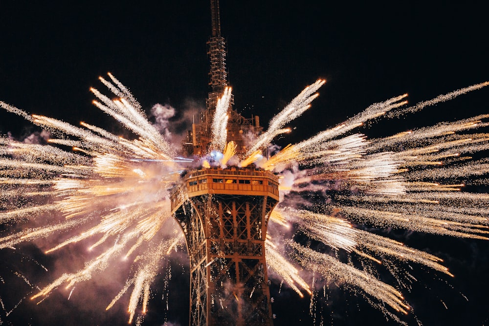 a tower that has some fireworks in it