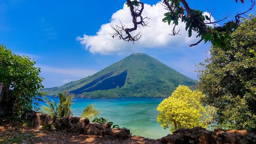 a view of a mountain and a body of water