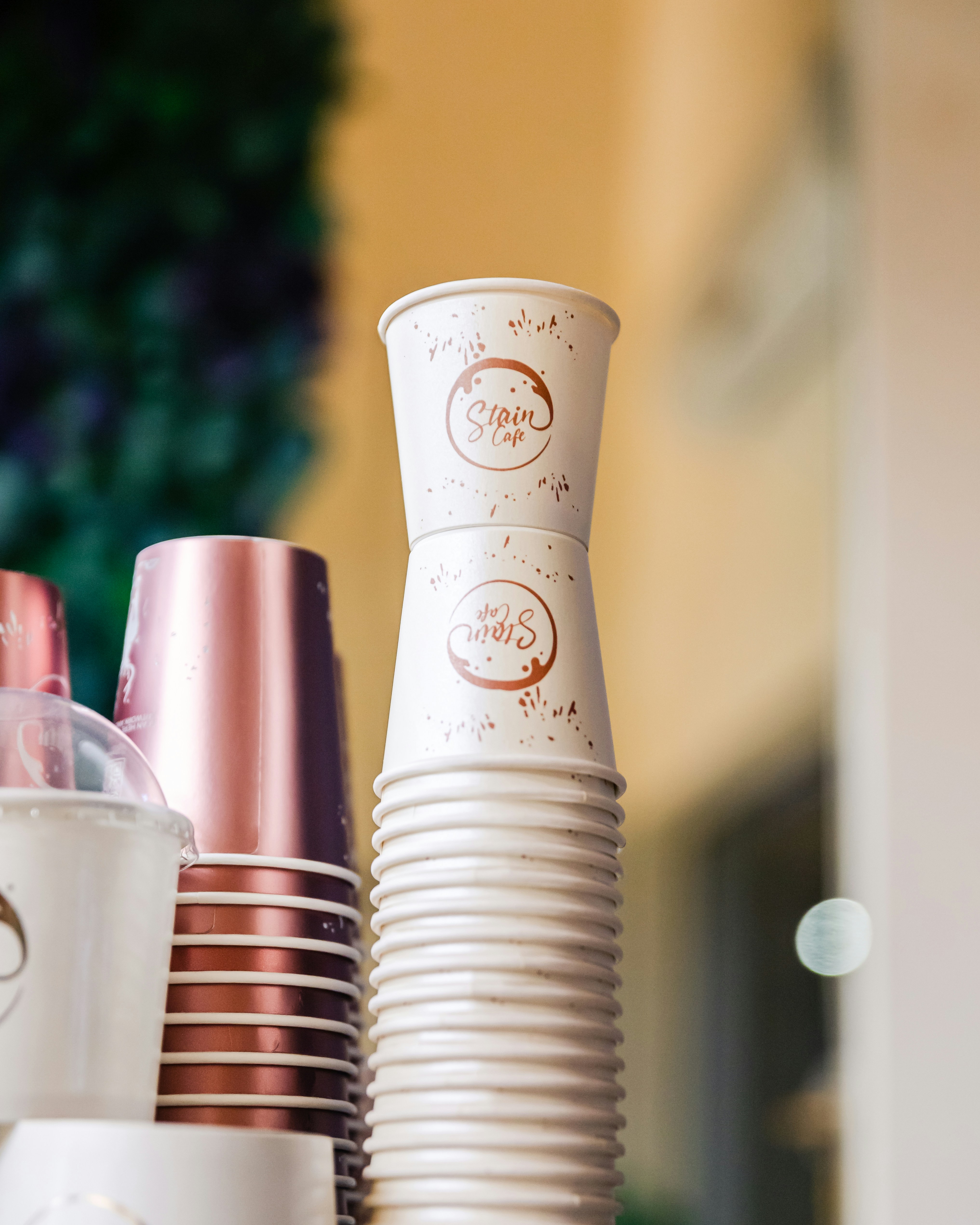a stack of coffee cups sitting on top of a table