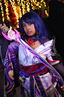 A joyful cosplayer captured mid-pose, transformed into a detailed 3D printed figurine.