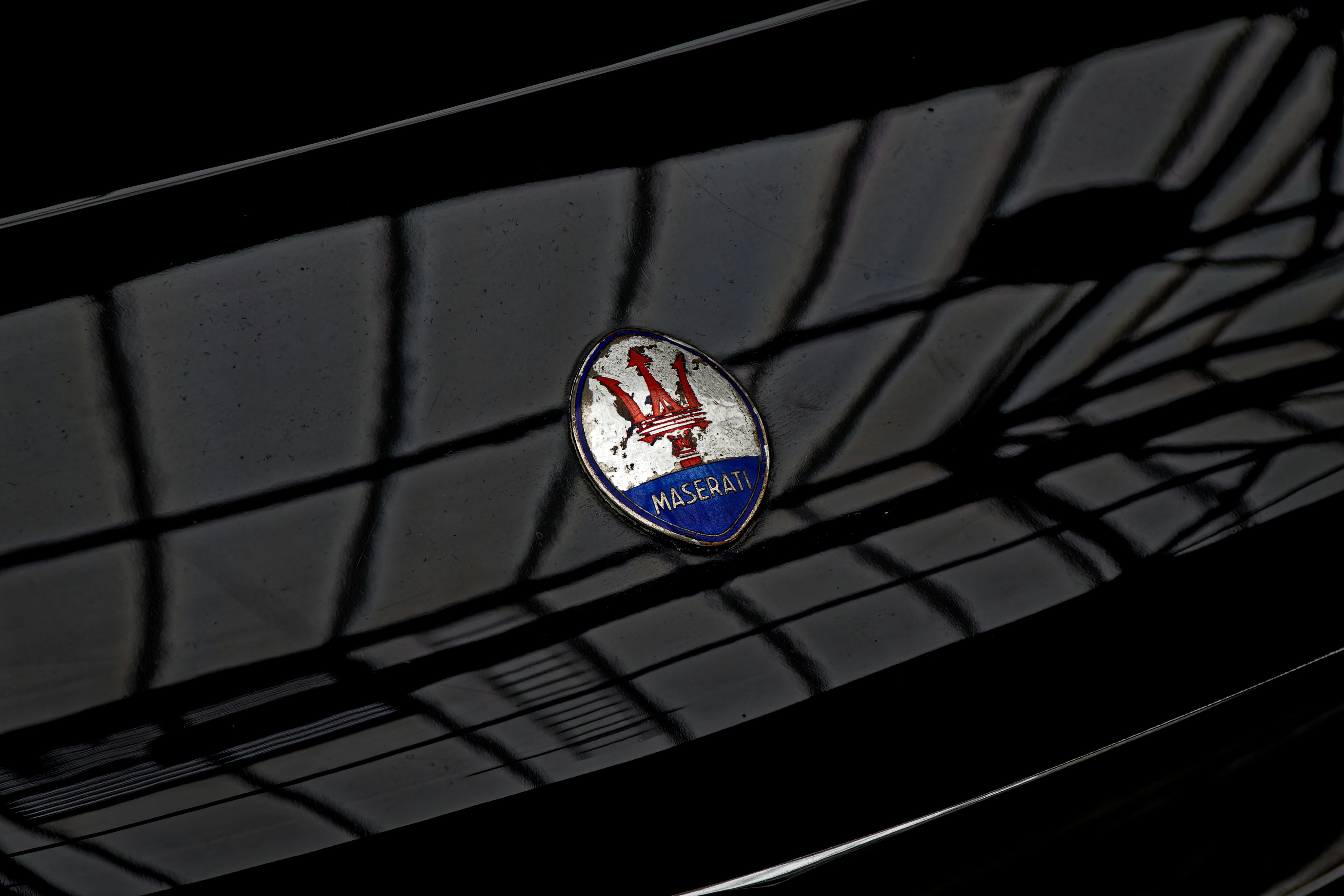 A close up of a badge on a car photo – Free Car Image on Unsplash