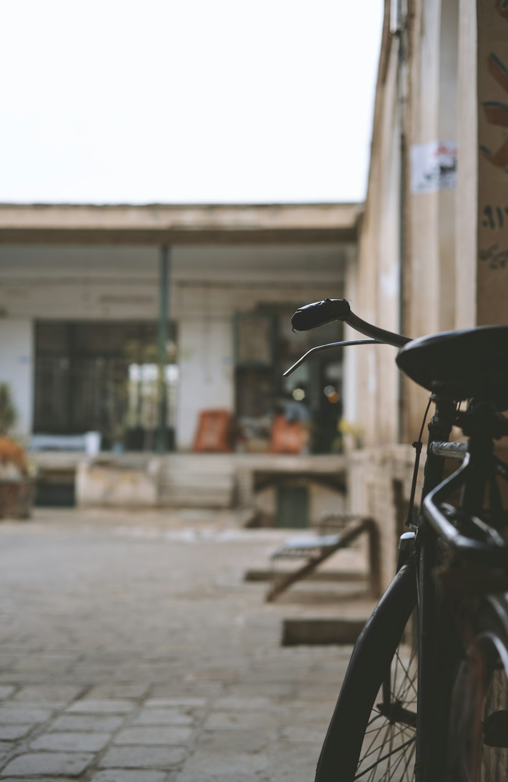 a bicycle parked in front of a building