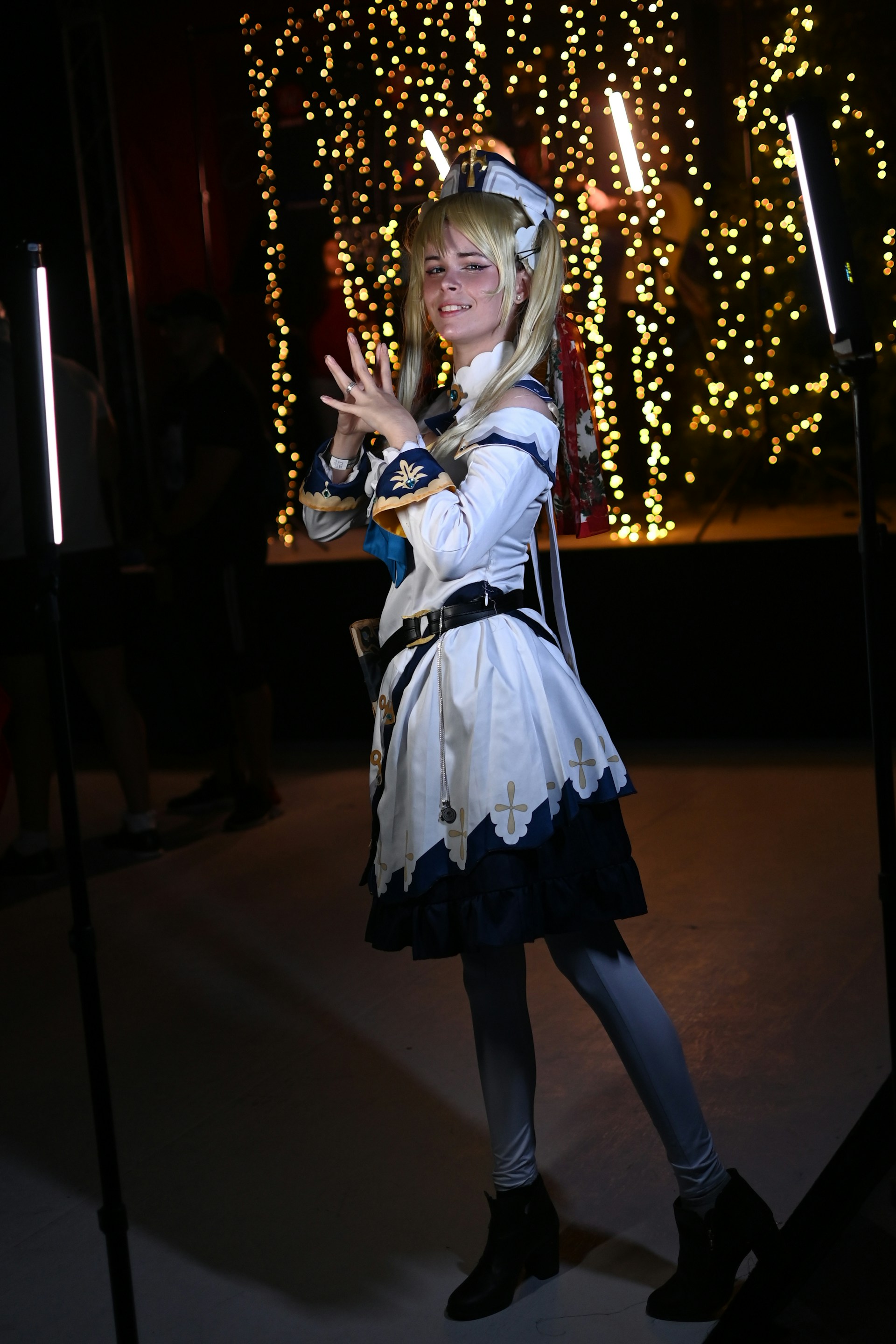 A wide shot of a finished costume displayed under soft lighting, emphasizing minimalist design and craftsmanship.