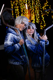 Both characters standing side by side, the magic stick glowing between them, ready for wild adventures.