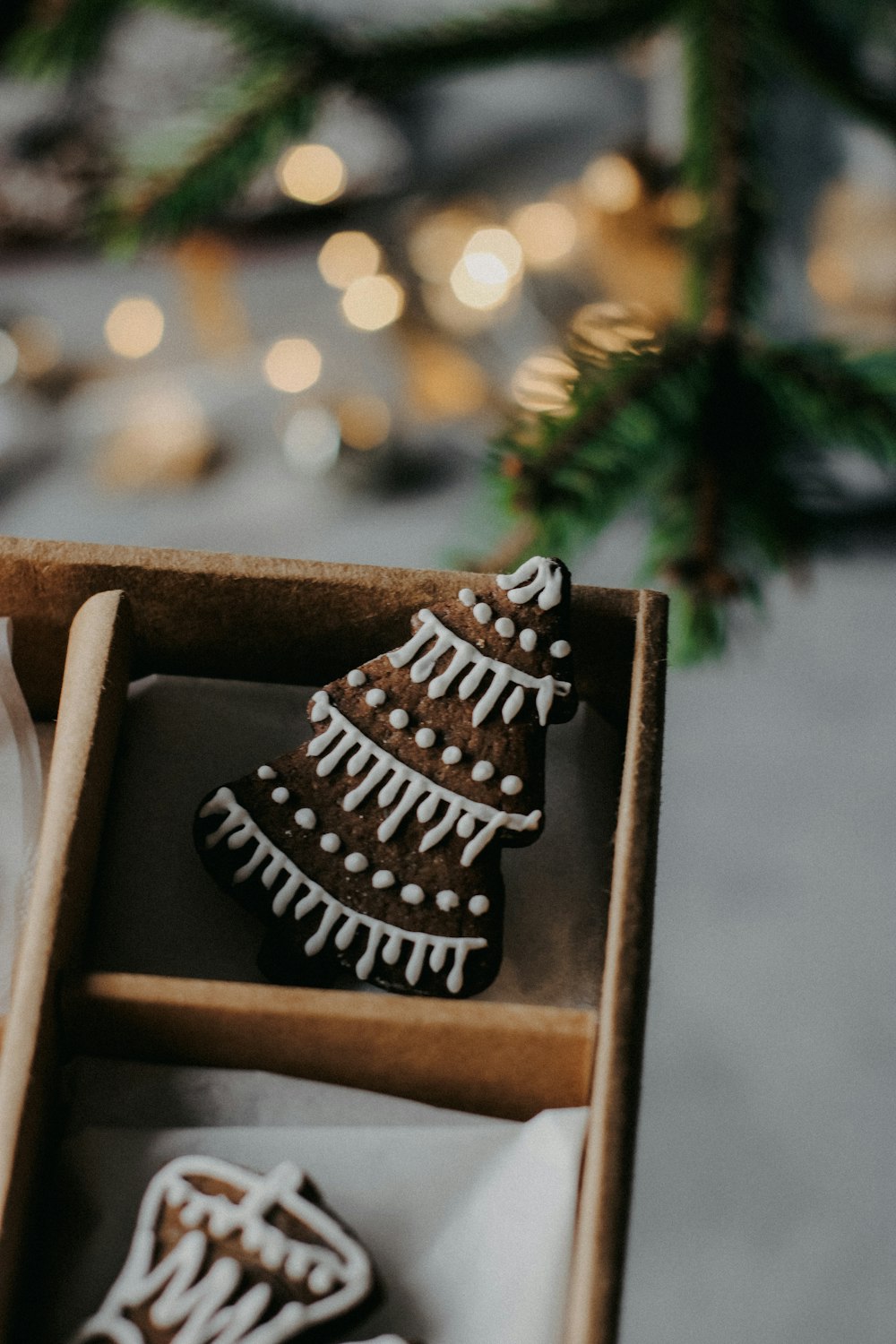 a box of decorated cookies sitting on top of a table