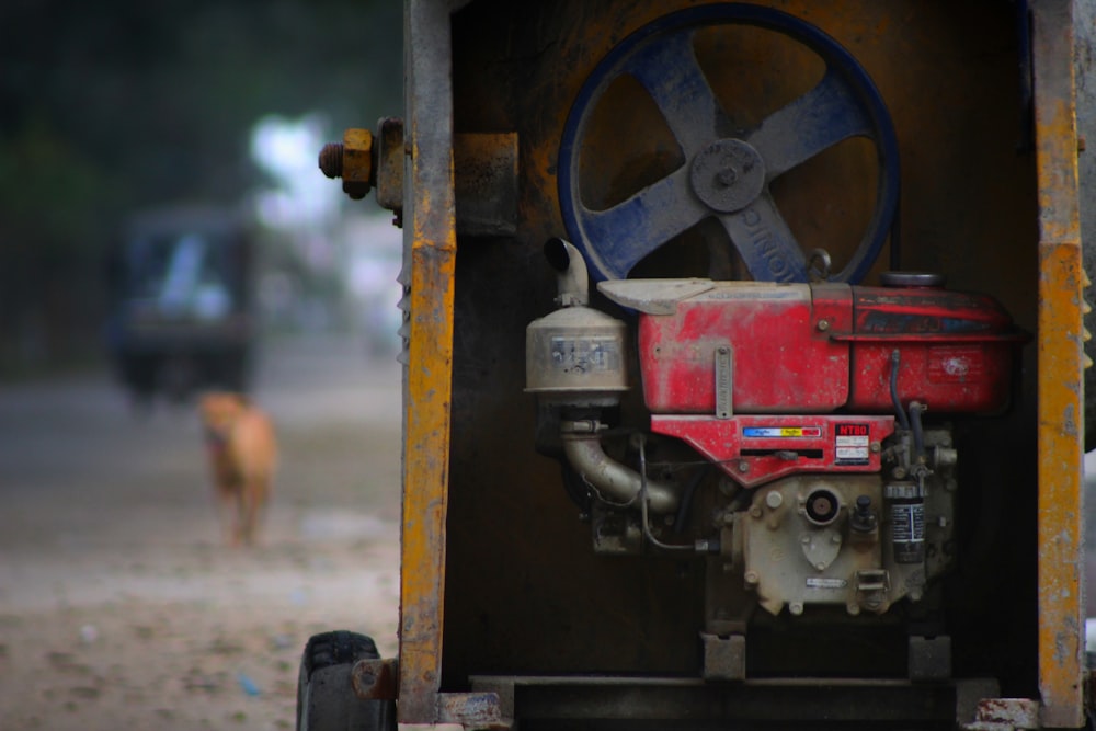 a close up of a red and white engine on a truck