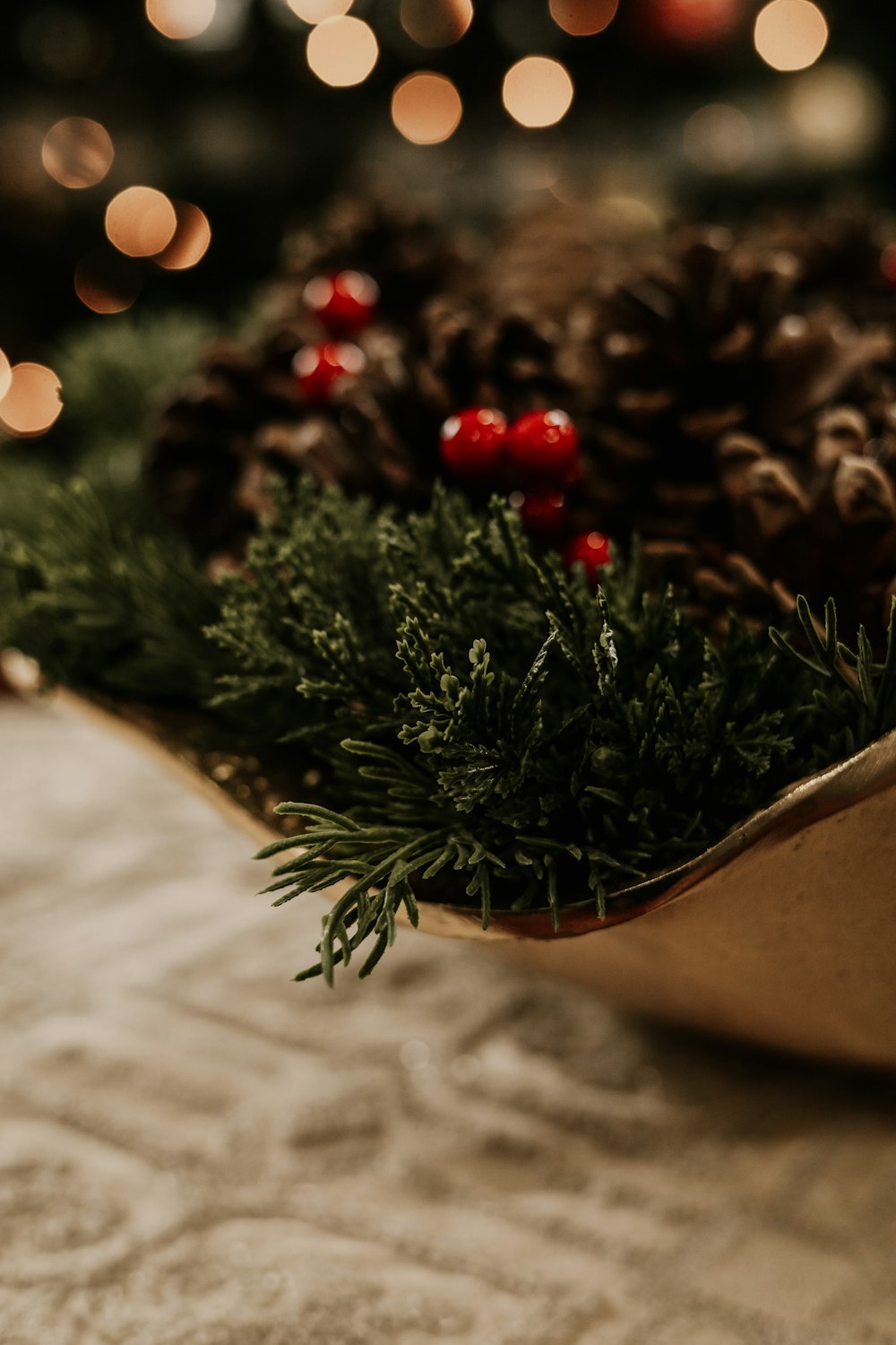 a close up of a bowl of pine cones