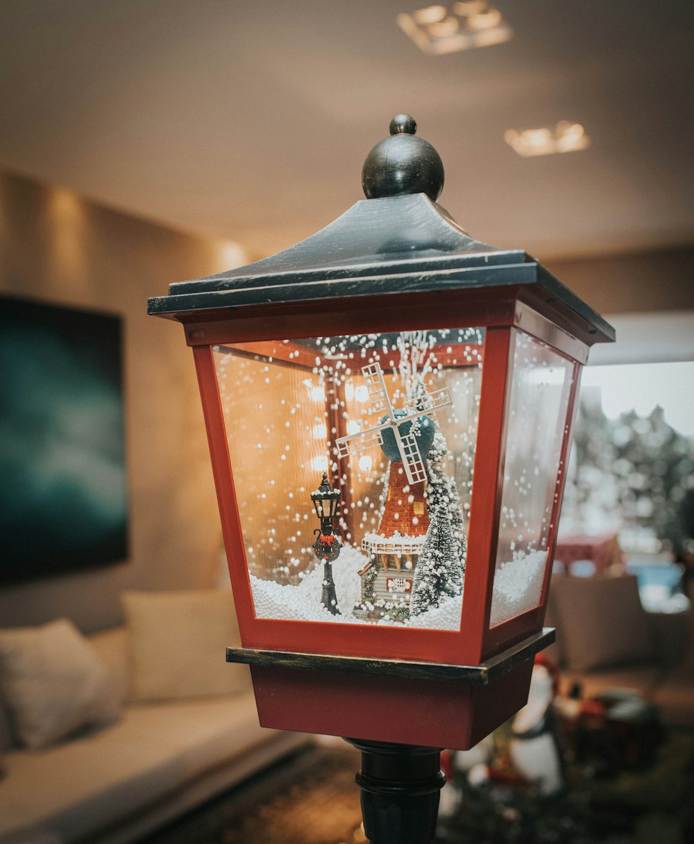 a red lantern with a picture of a guitar on it