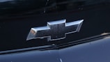 a close up of a chevrolet logo on a car