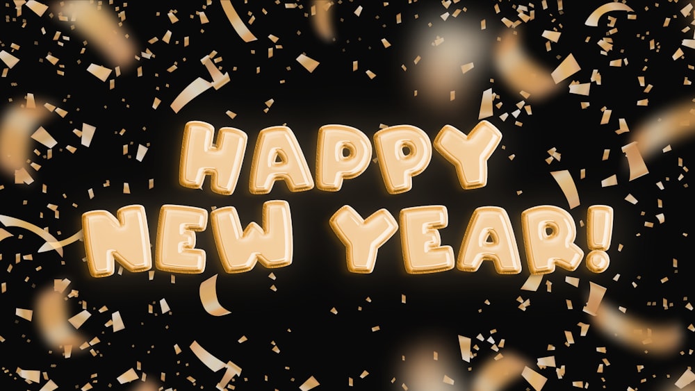 Un messaggio di felice anno nuovo circondato da coriandoli