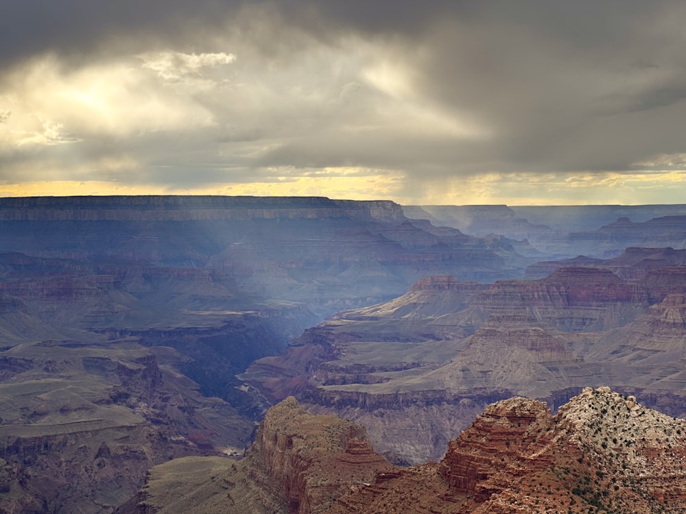 a view of the grand canyon from the rim of a cliff