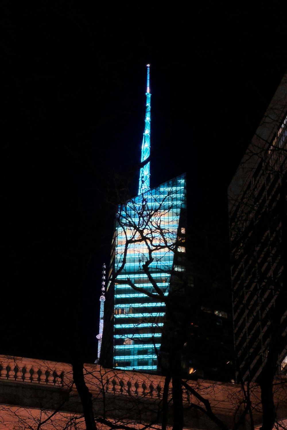 a very tall building lit up at night