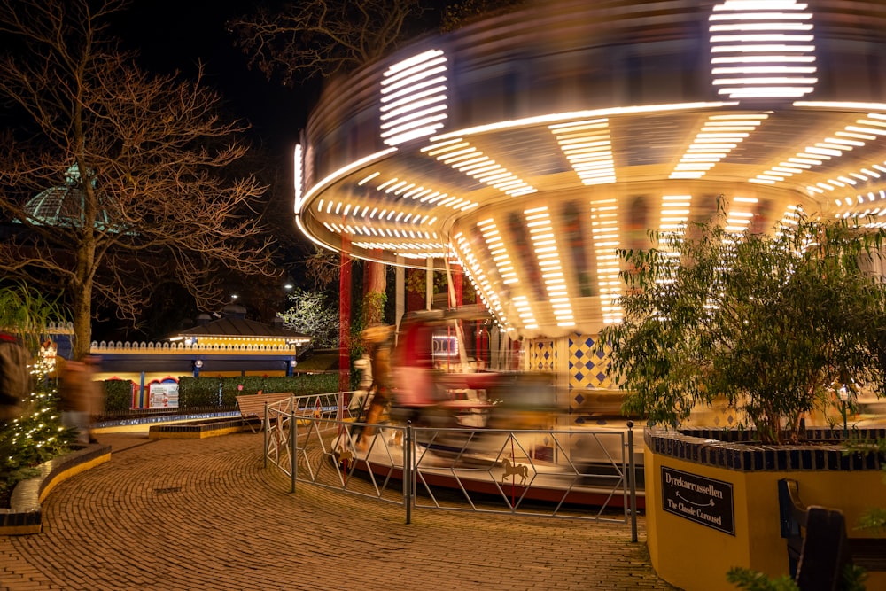 a merry go round ride at night time