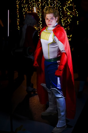 A customer wearing a full comic book style outfit, posing confidently in the store.