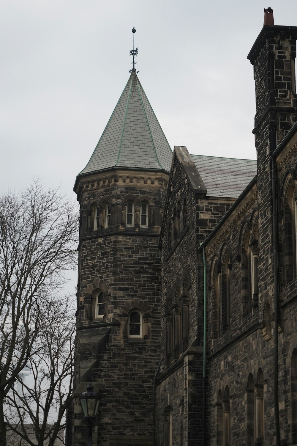 a tall building with a clock on the top of it