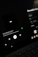 A digital music player screen showing a freshly delivered custom song ready to play.