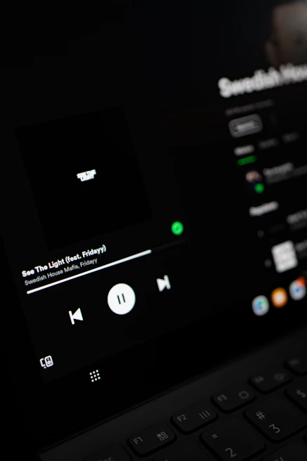 A close-up shot of a video player interface with dark mode colors and a highlighted play button