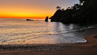 A peaceful sunset over a calm sea, symbolizing hope.