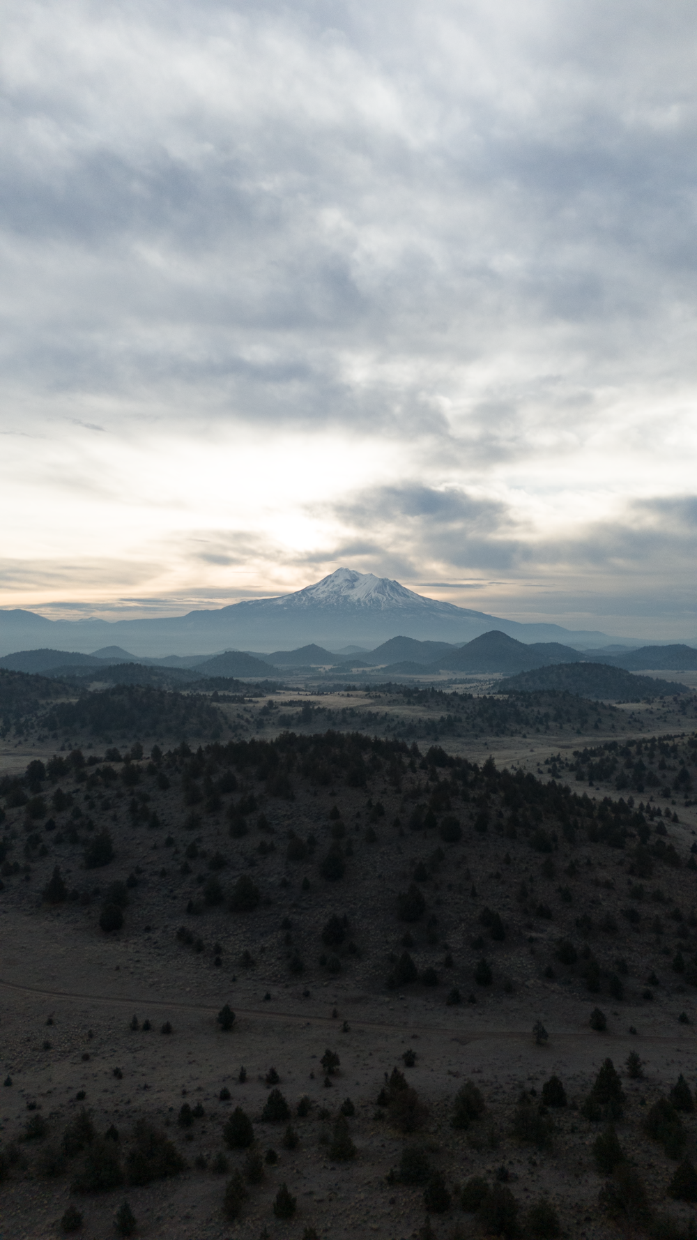 a view of a mountain range from a distance