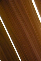 Installation of marine plywood panels in a sleek, modern interior project.