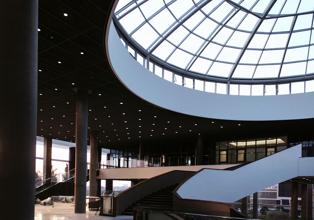 a large building with a staircase and a skylight