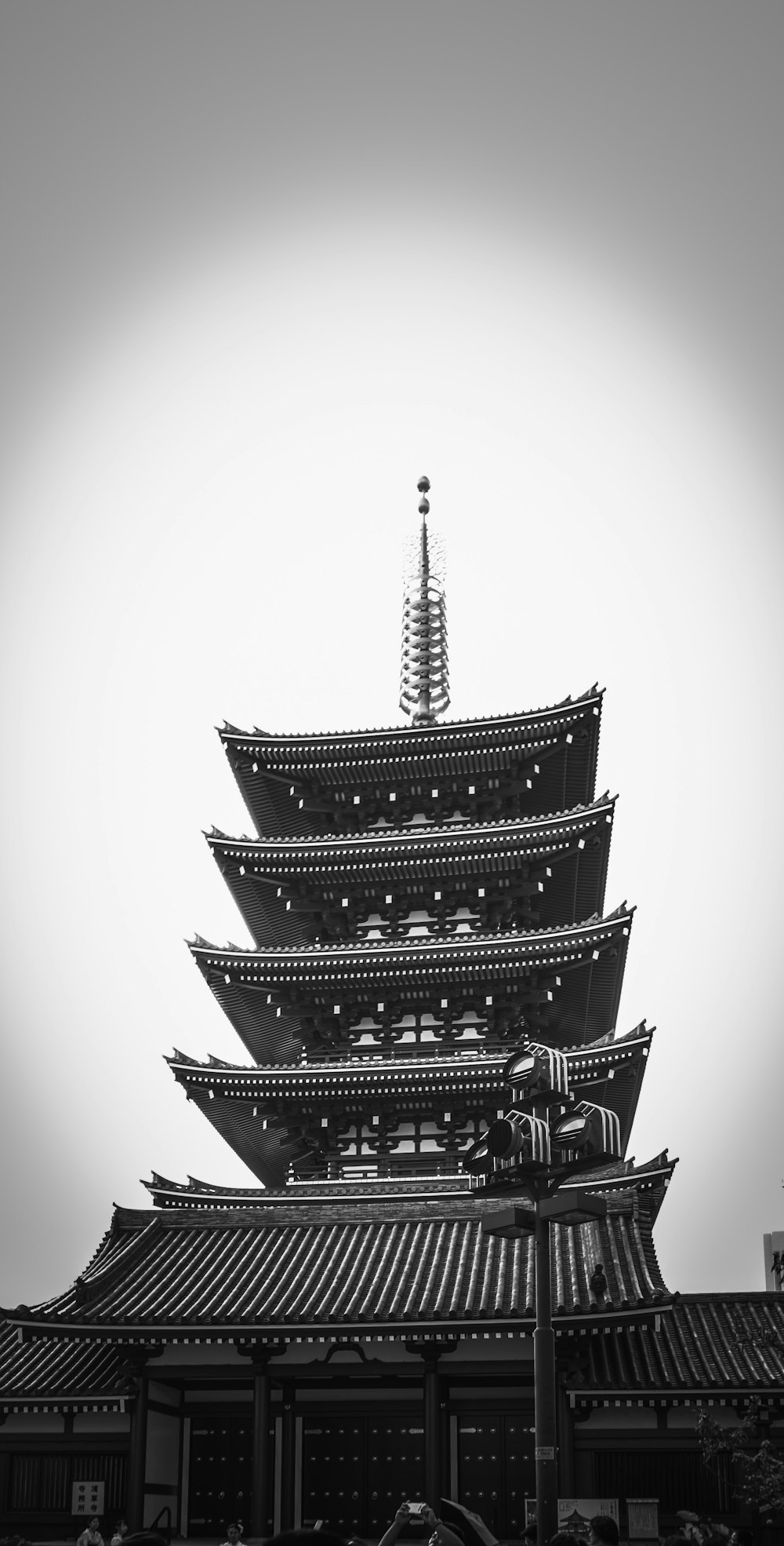 a black and white photo of a tall building