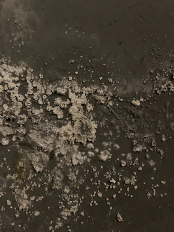 Scaleease-40 solution being applied to a heavily scaled surface.