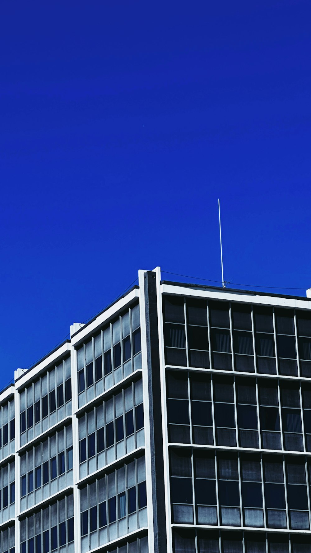 a tall building with a clock on the top of it