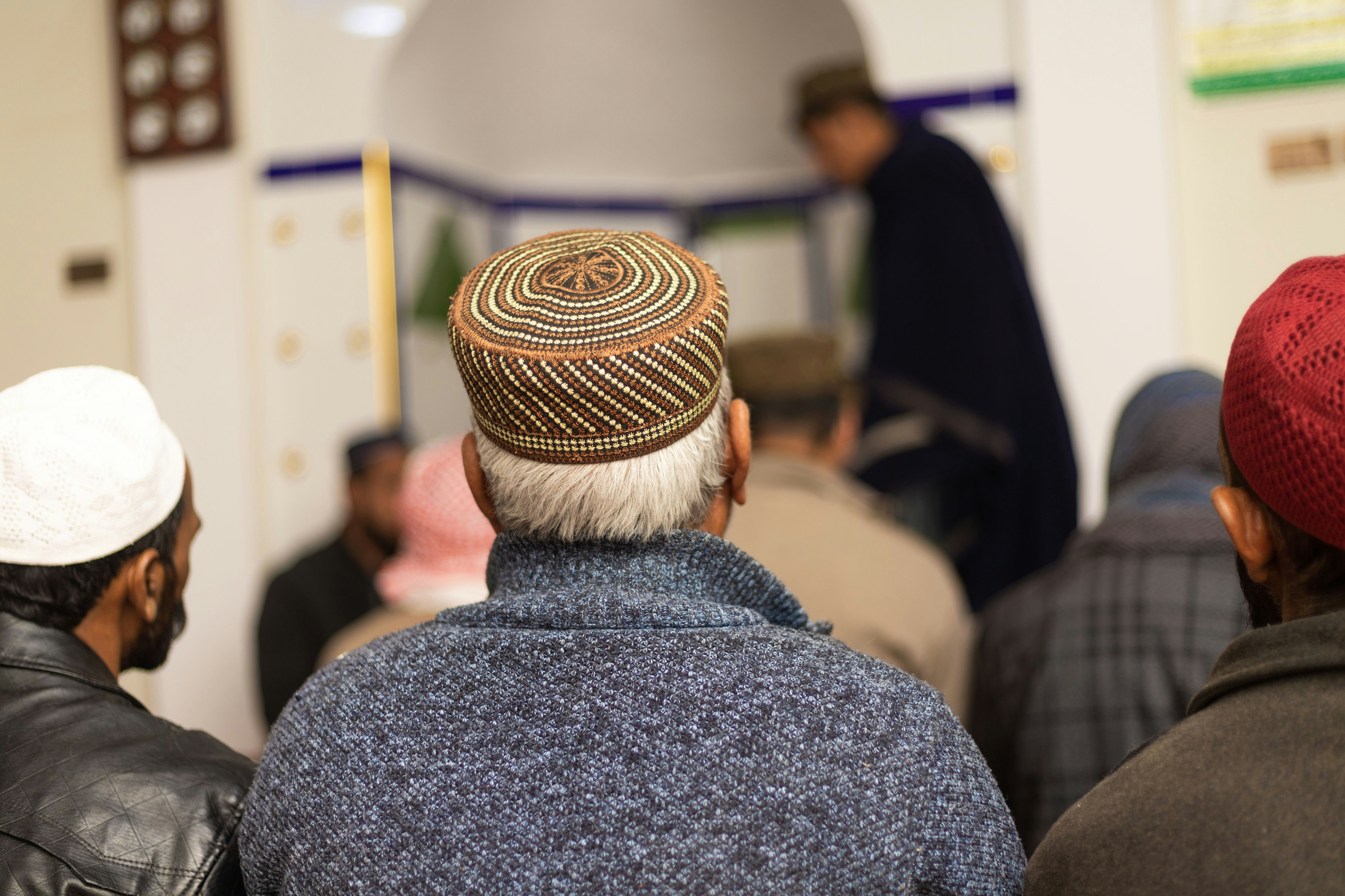a group of men standing next to each other