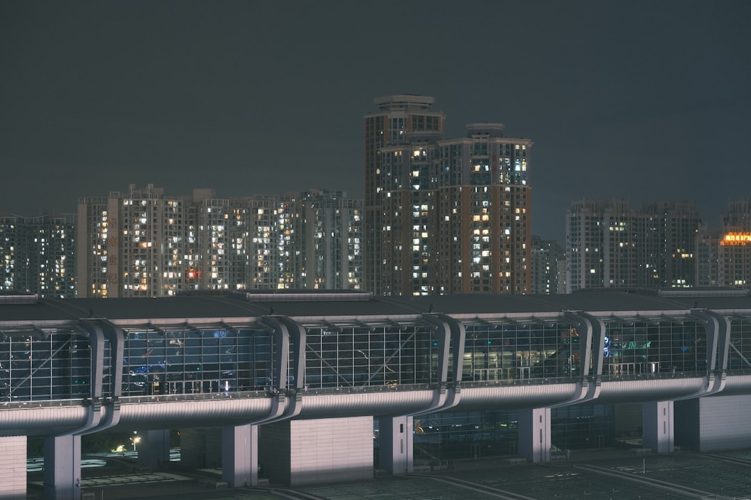 a night view of a city skyline with buildings,