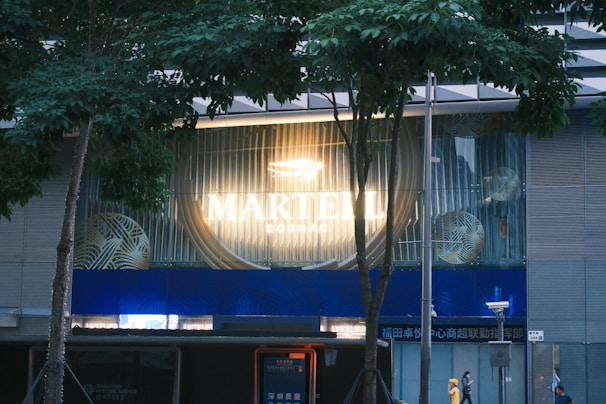 A small business storefront featuring signage designed by yellowaves studio, bathed in warm afternoon light.