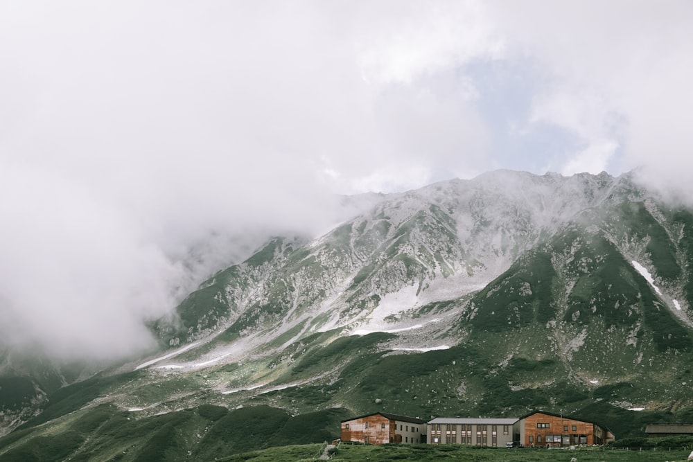 a mountain with a house in the foreground