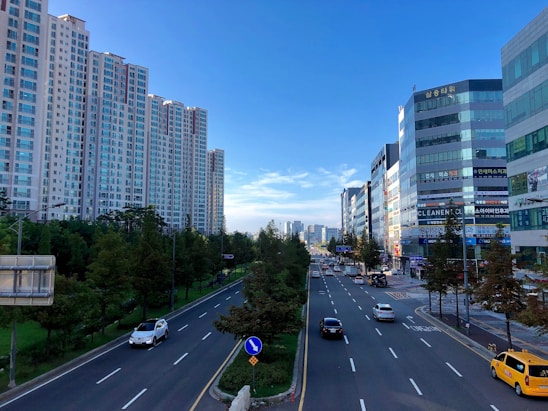 A vibrant community scene showing electric cabs and housing society facilities managed seamlessly with technology.