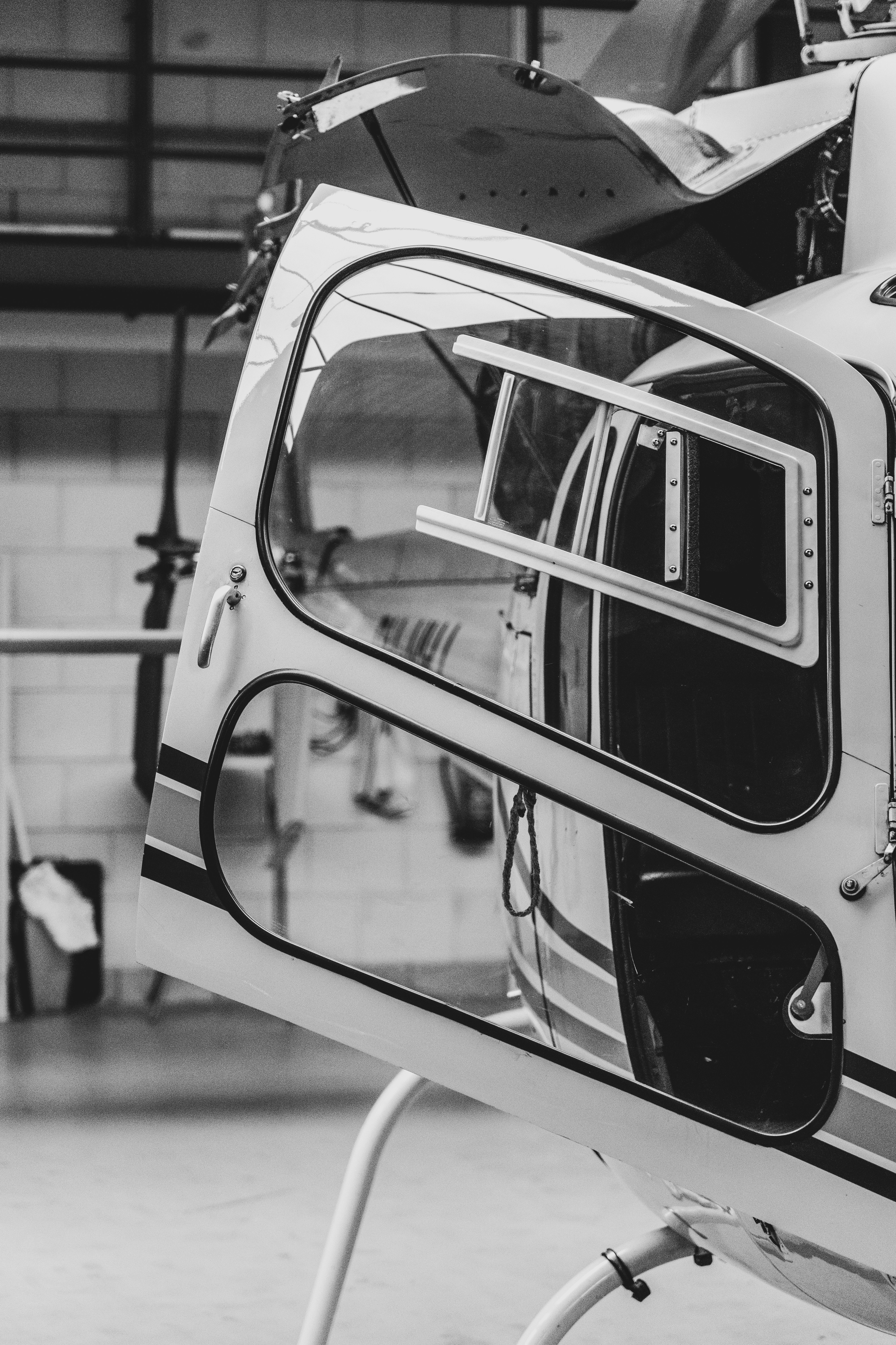 a close up of a helicopter in a hanger