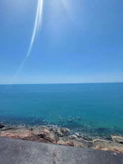 A serene view of turquoise waters along the coast of Cancún with gentle waves.