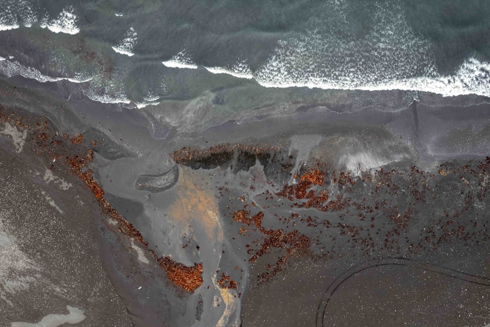 an aerial view of a beach and ocean