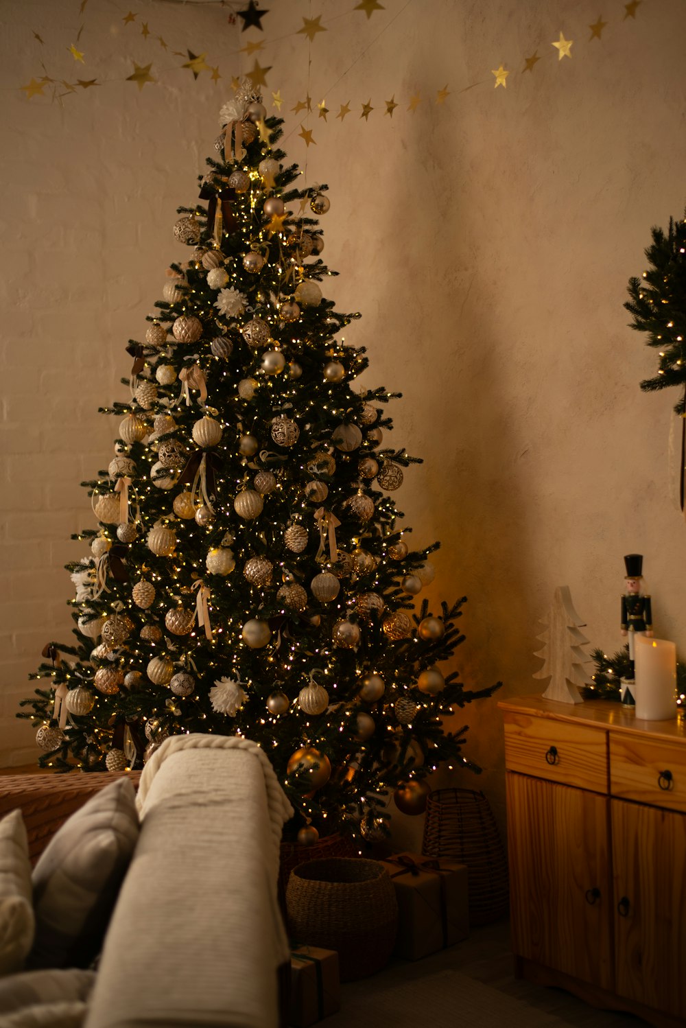 a decorated christmas tree in a living room