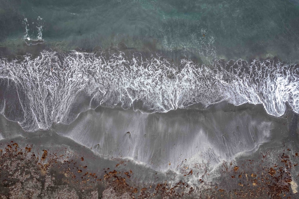 an aerial view of a beach and ocean