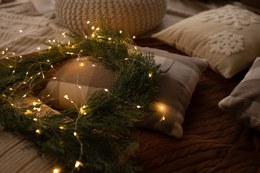 a bed with a wreath on top of it